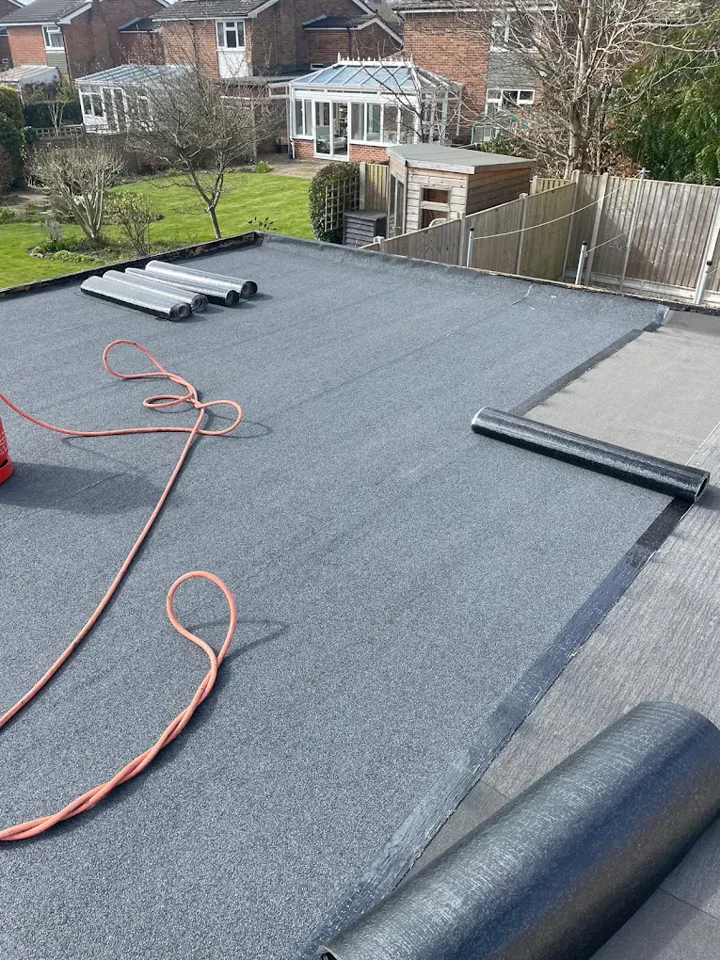 Flat-roof covering work in progress — supplied photograph