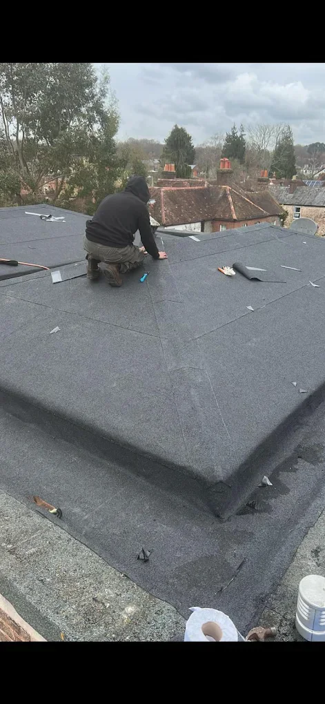 Flat-roof installation in progress — supplied photograph